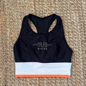 P.E Nation Black and White Sports Top with Orange Accent